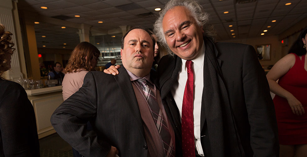 alums posing for a photo