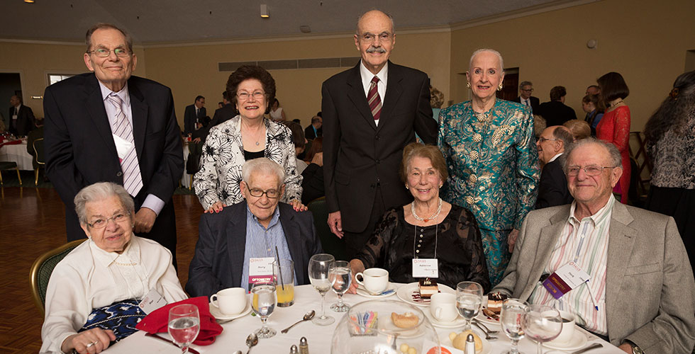 alums posing for a photo