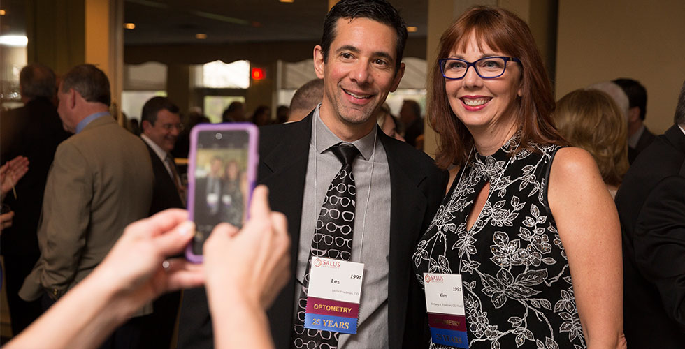 alums posing for a photo