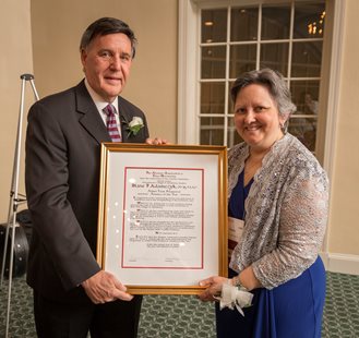 Dr. Adamczyk accepting her award