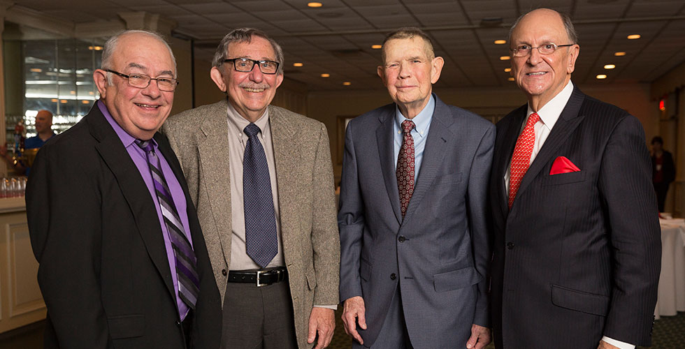 alums posing for a photo