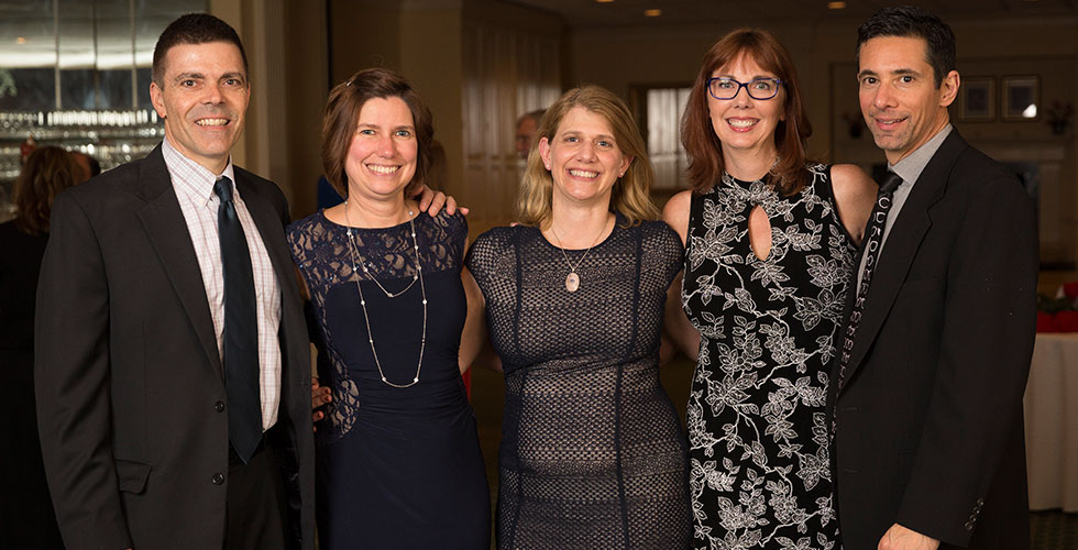 alums posing for a photo