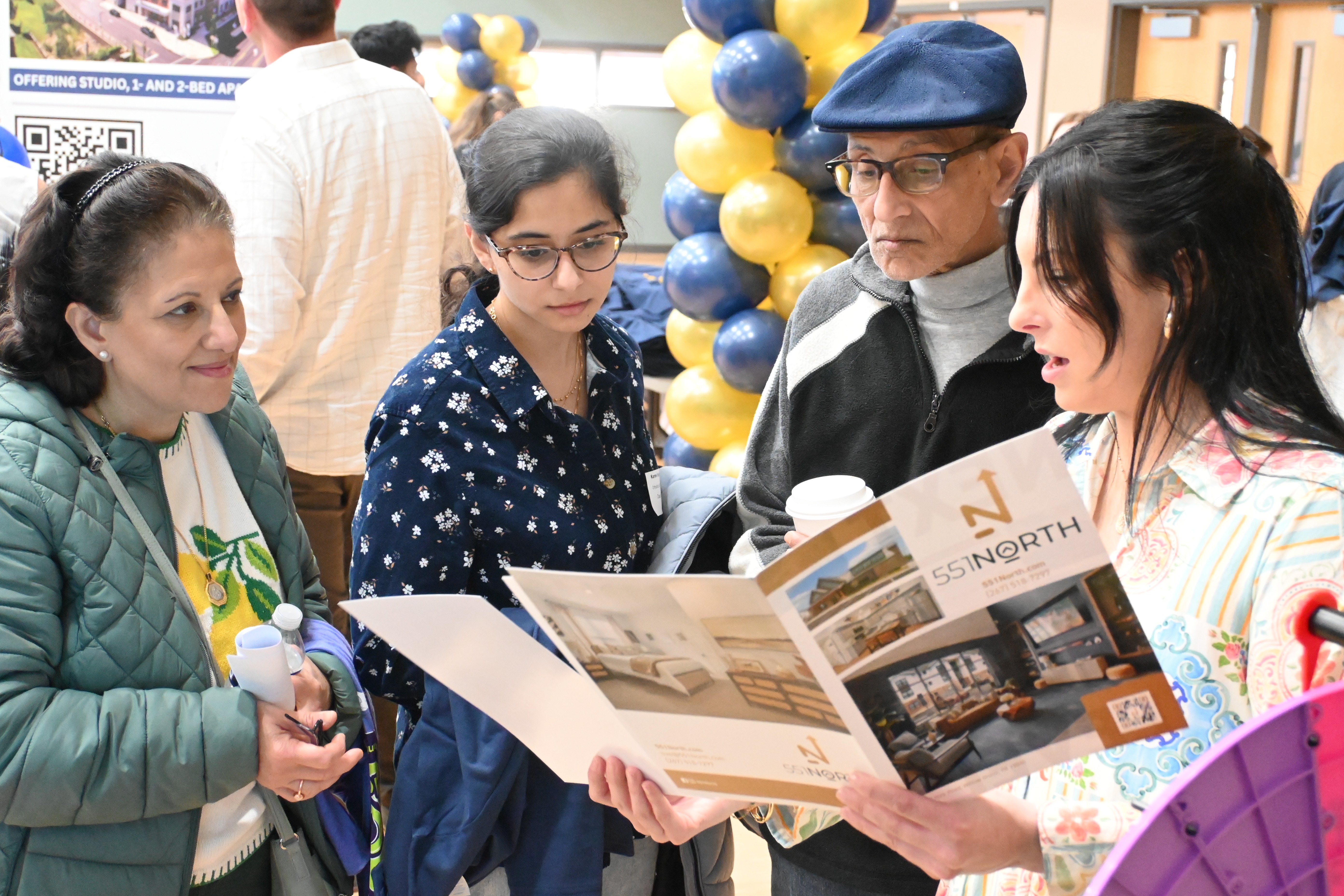 Student and parents look at housing information pic1