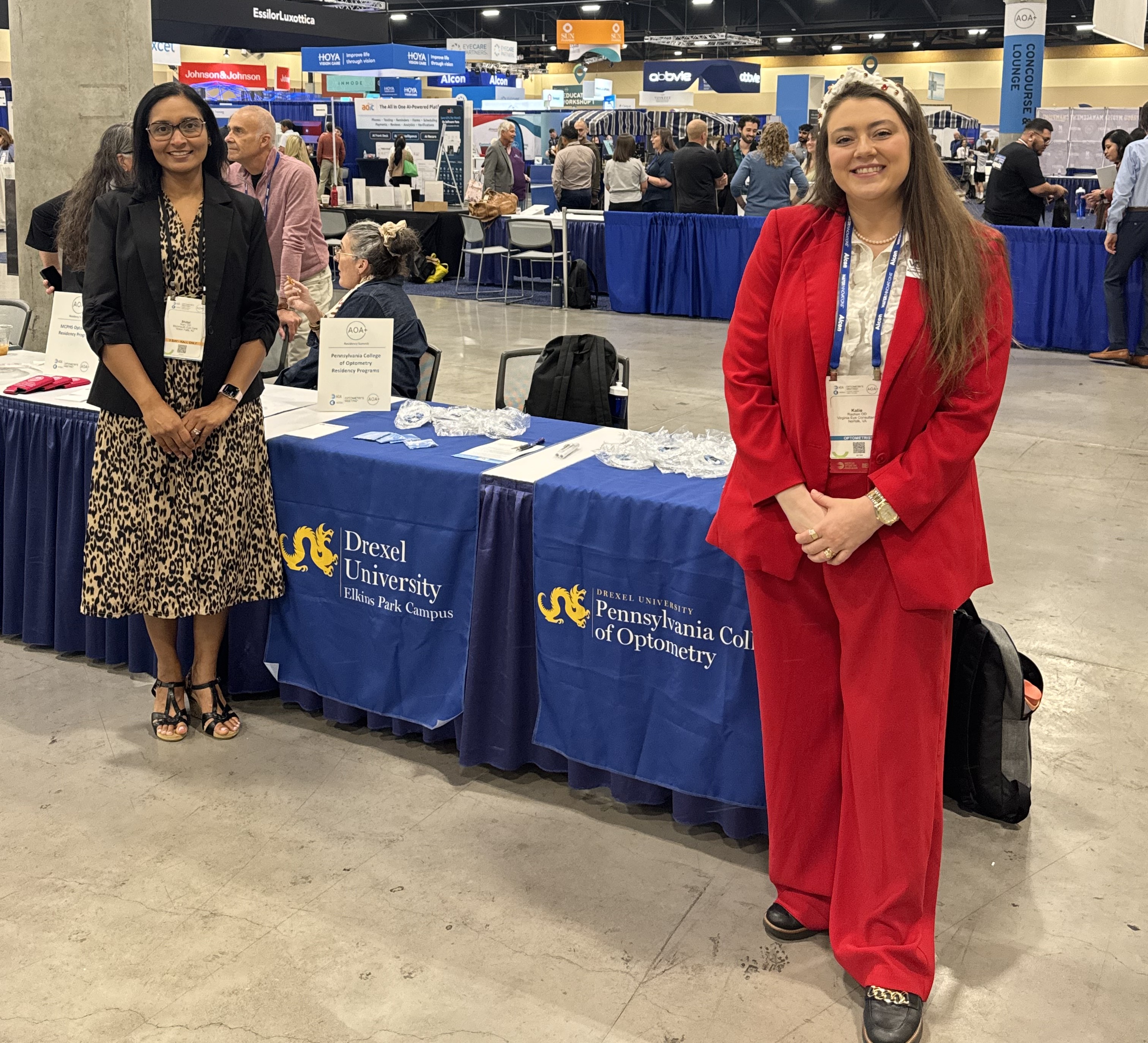 Two PCO faculty at AOA booth