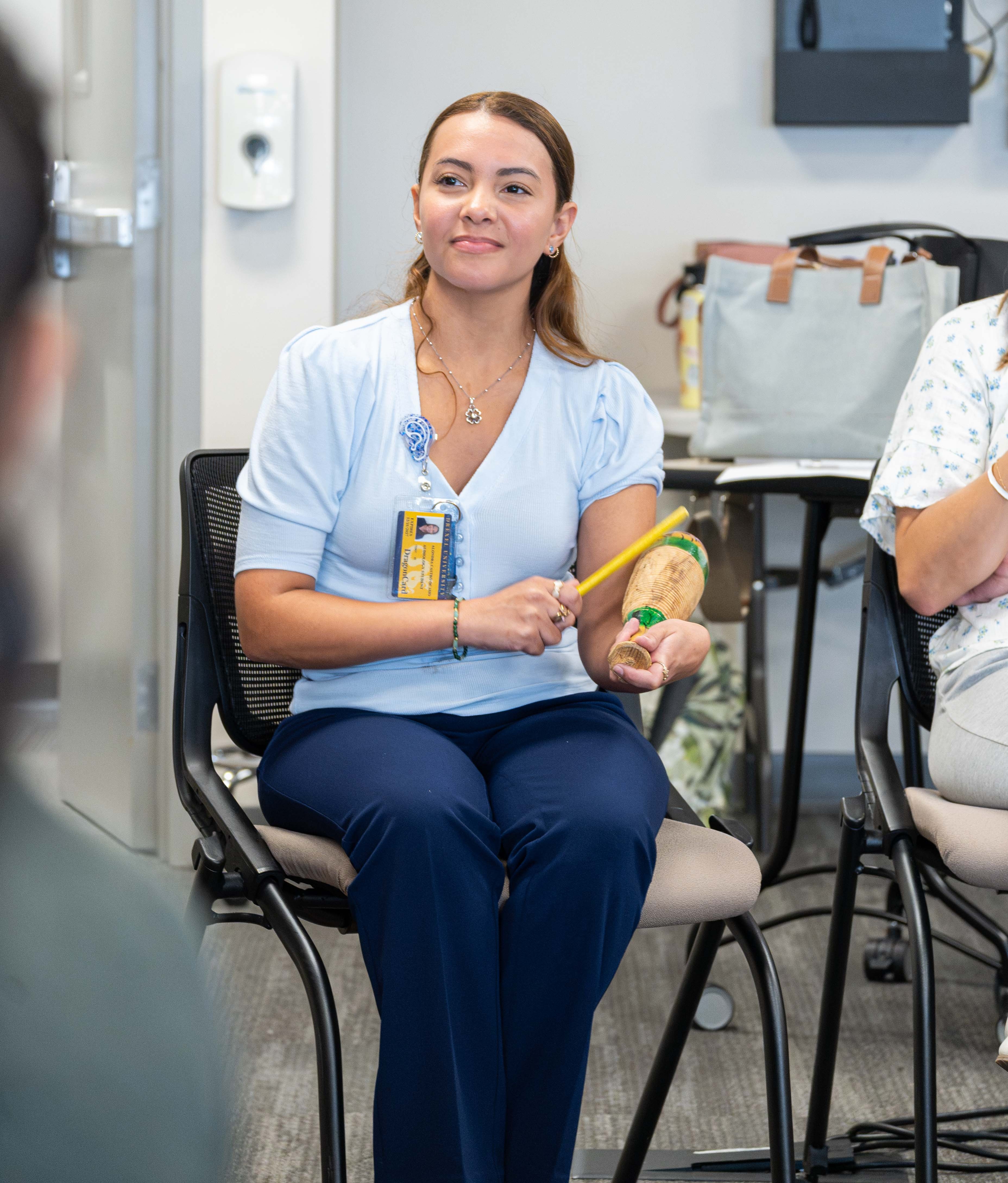 AUD student looks on during music therapy session