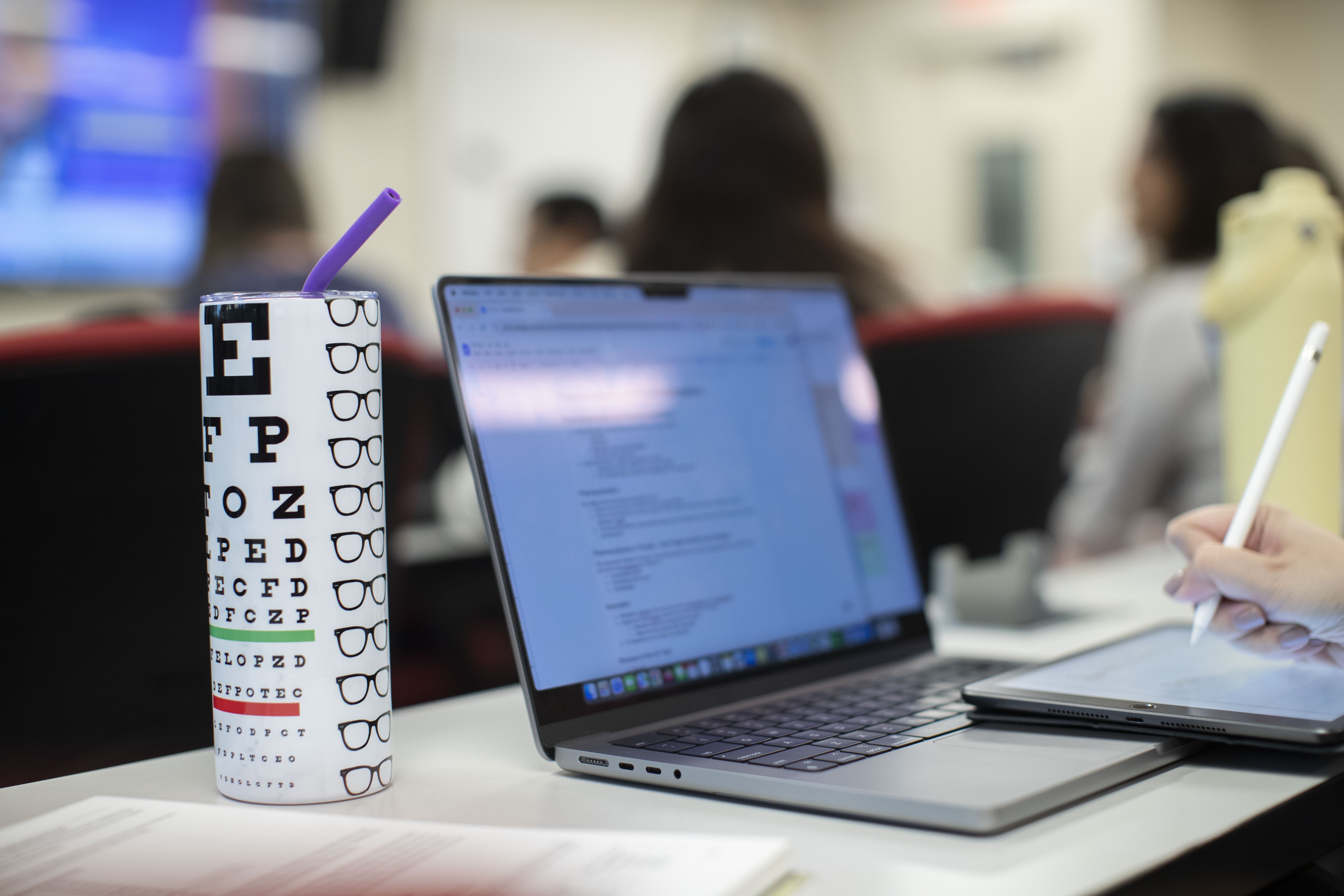 Eye chart mug and laptop