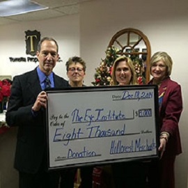 Representatives from Tornetta Properties, Inc., Kimberly Tornetta-Attanasio and Beth McGuffin, presented the check to Salus president, Dr. Michael H. Mittelman, & chief of staff, Dr. Susan C. Oleszewski.
