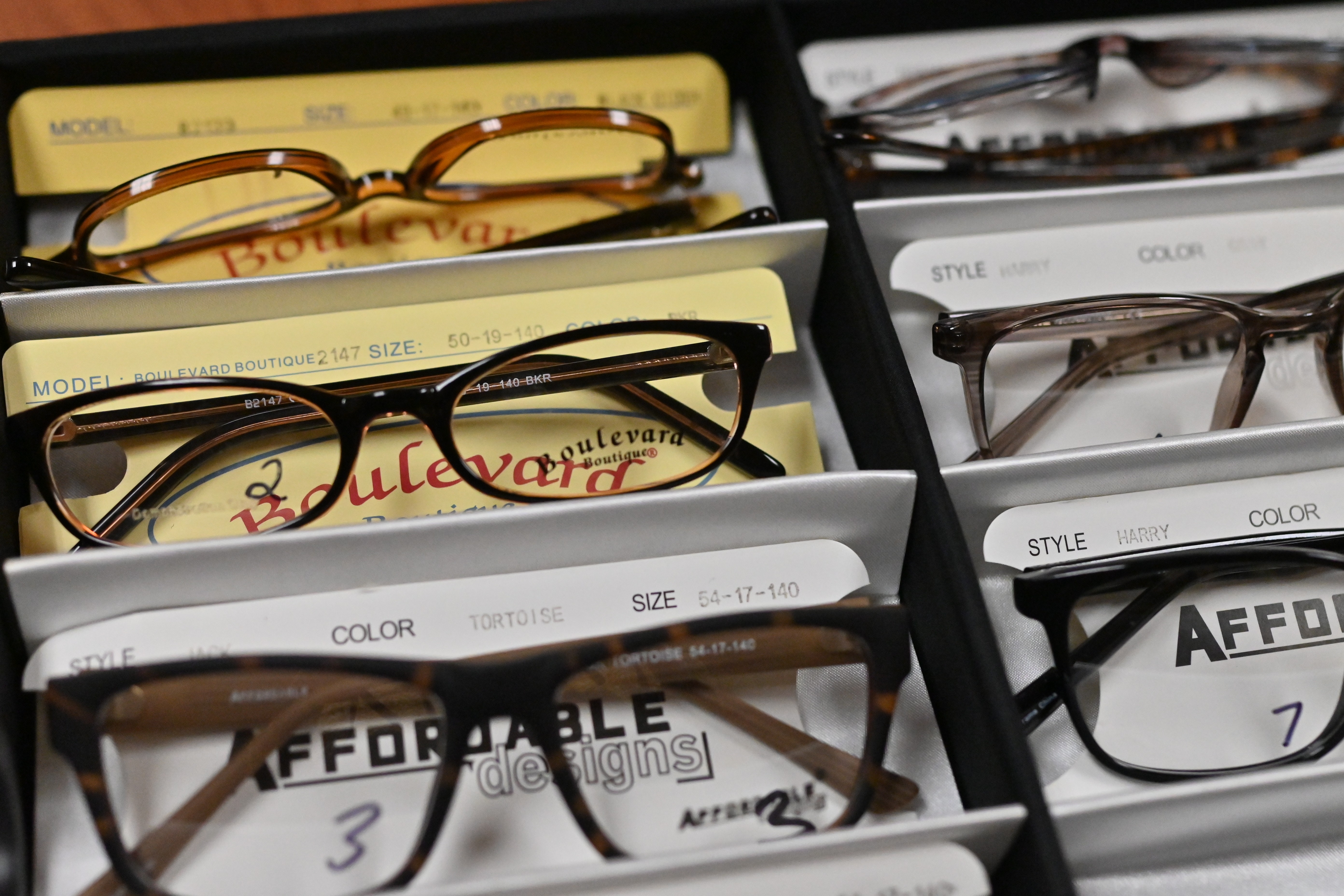 Rack full of free eyeglasses