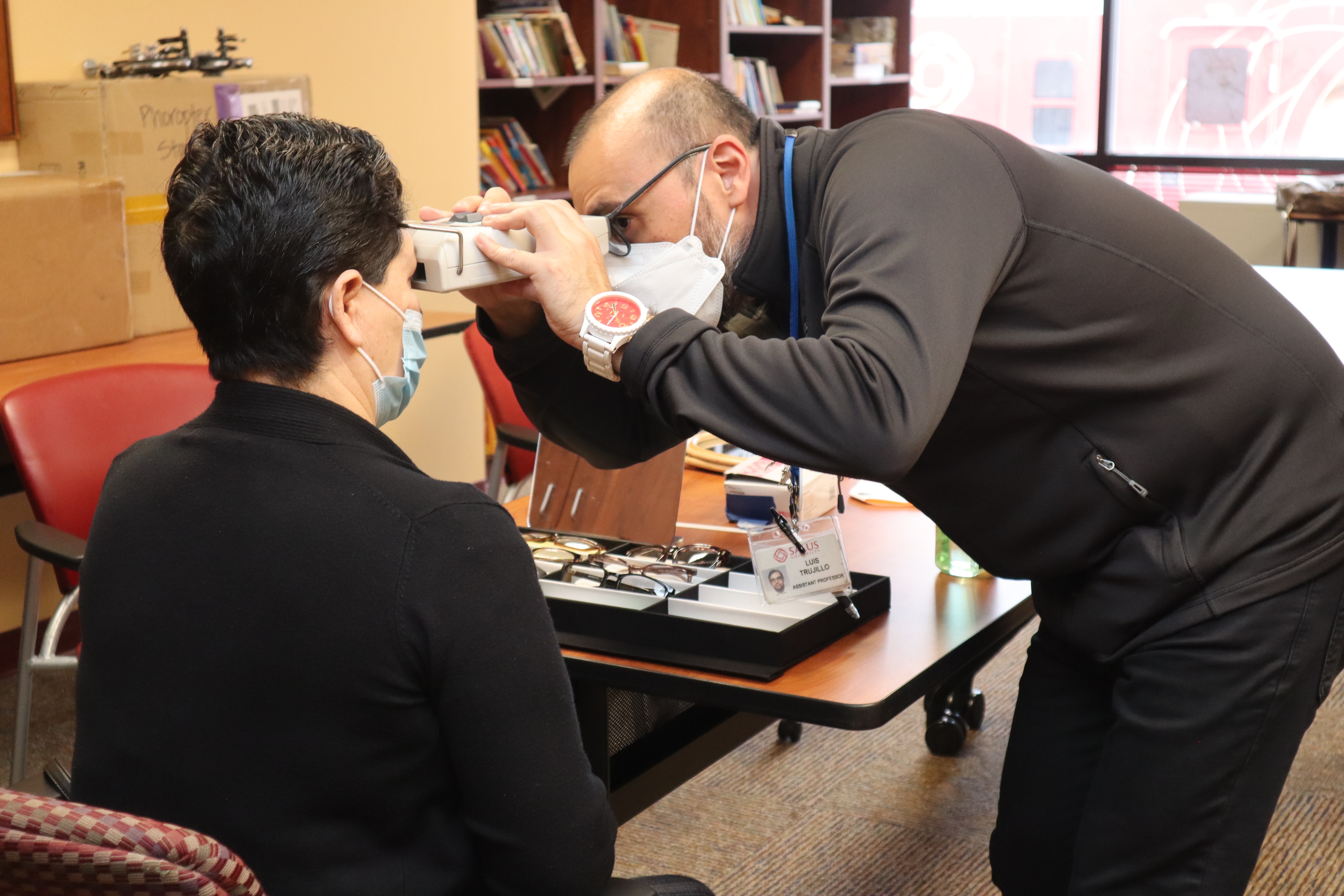 Dr. Trujillo examines patient on the mobile unit