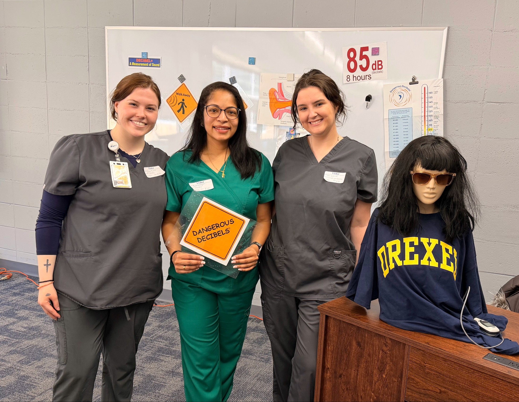 Dr. Rajan and two PEI students