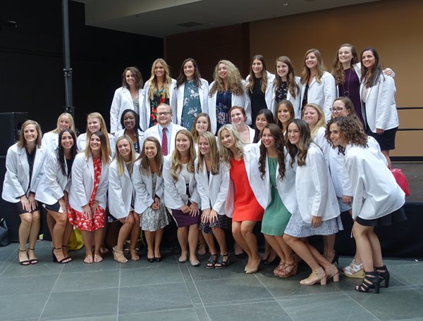 students at white coat