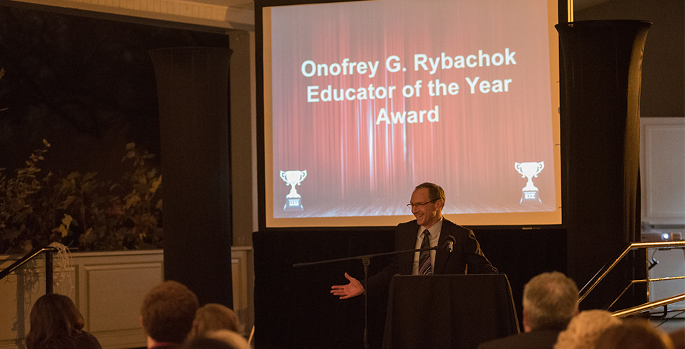 dr. mittelman presenting an award at SAG
