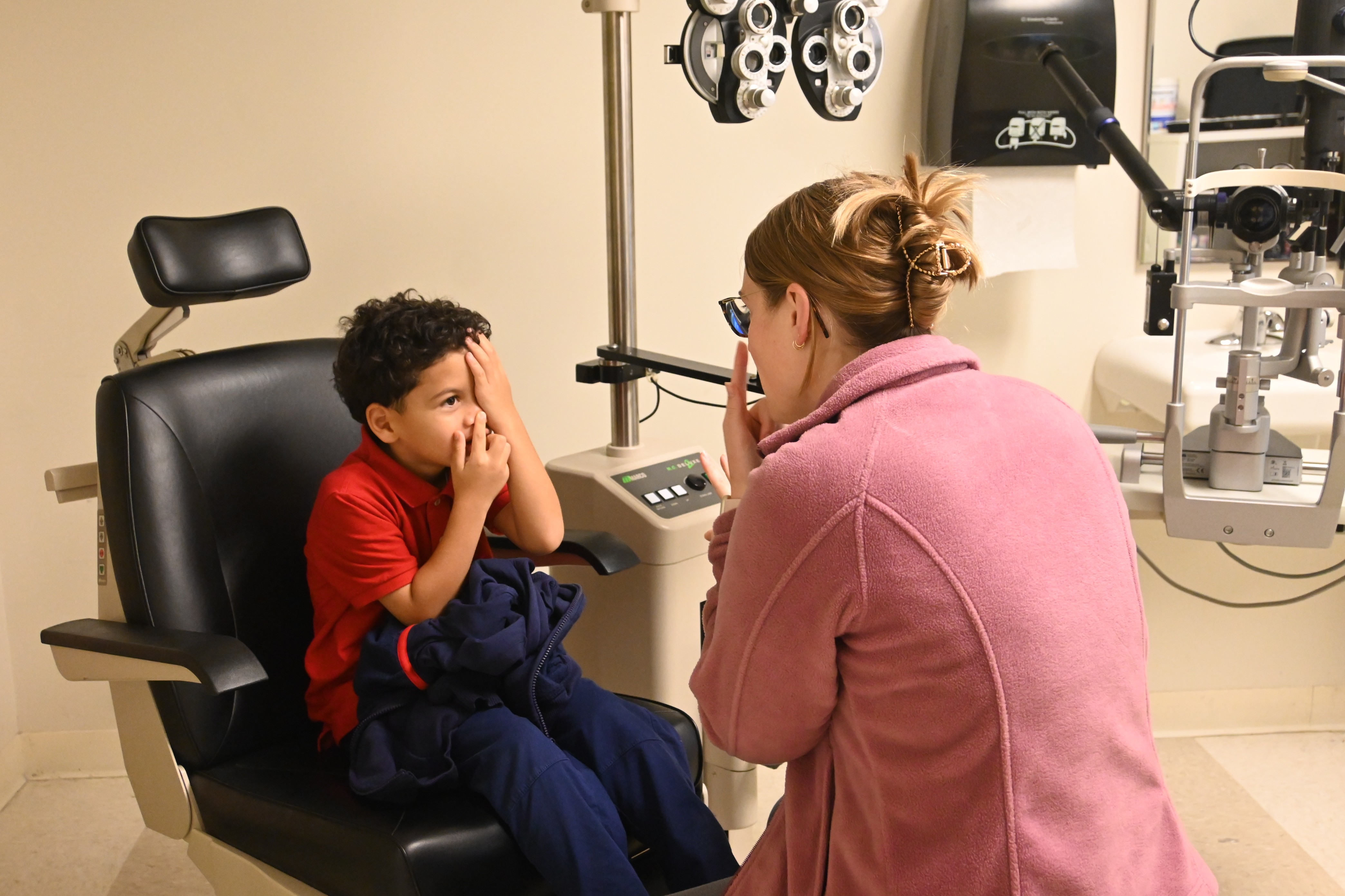 Madison examining a child 