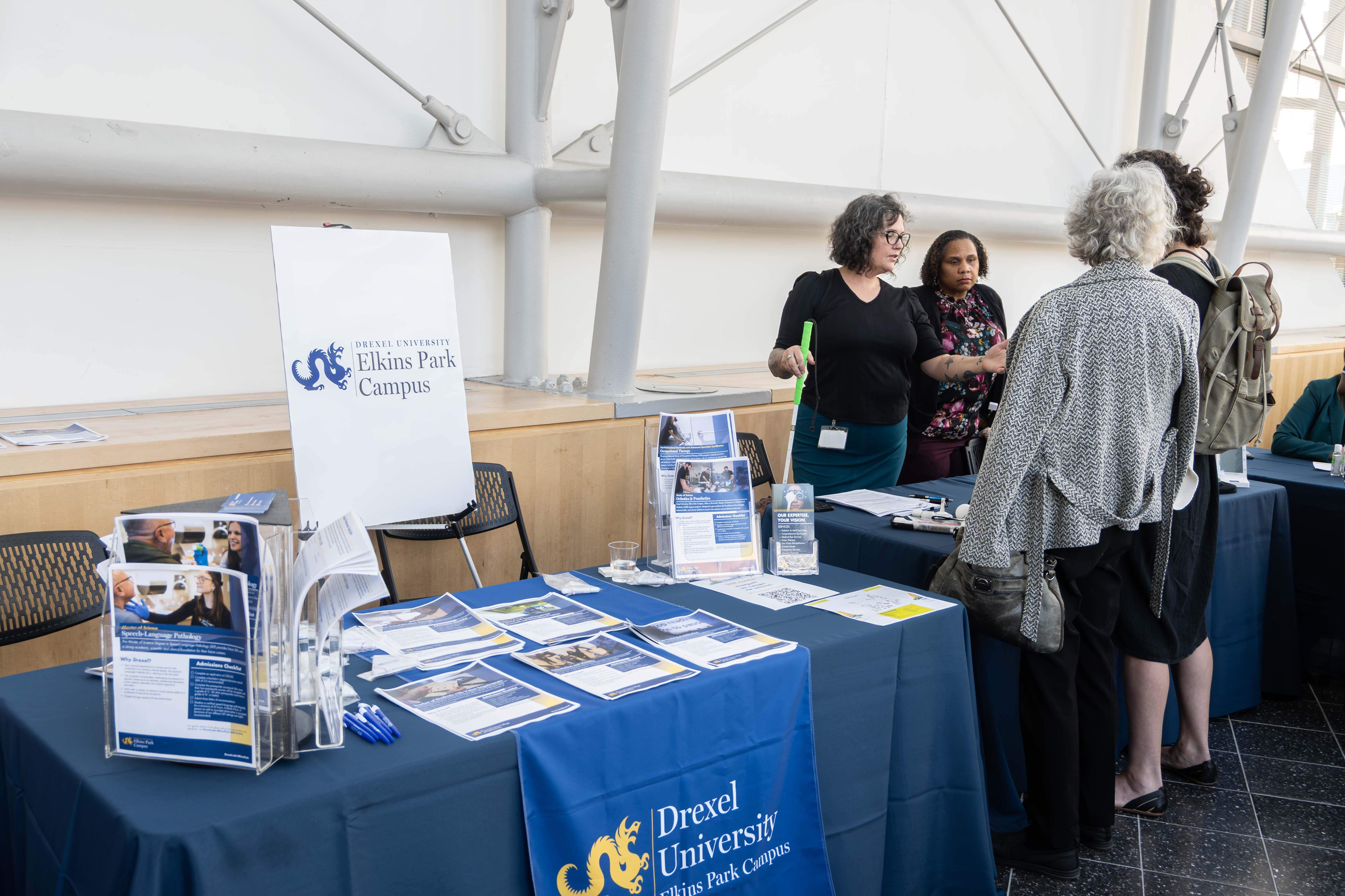 Lachell Smith at Farnese Symposium booth