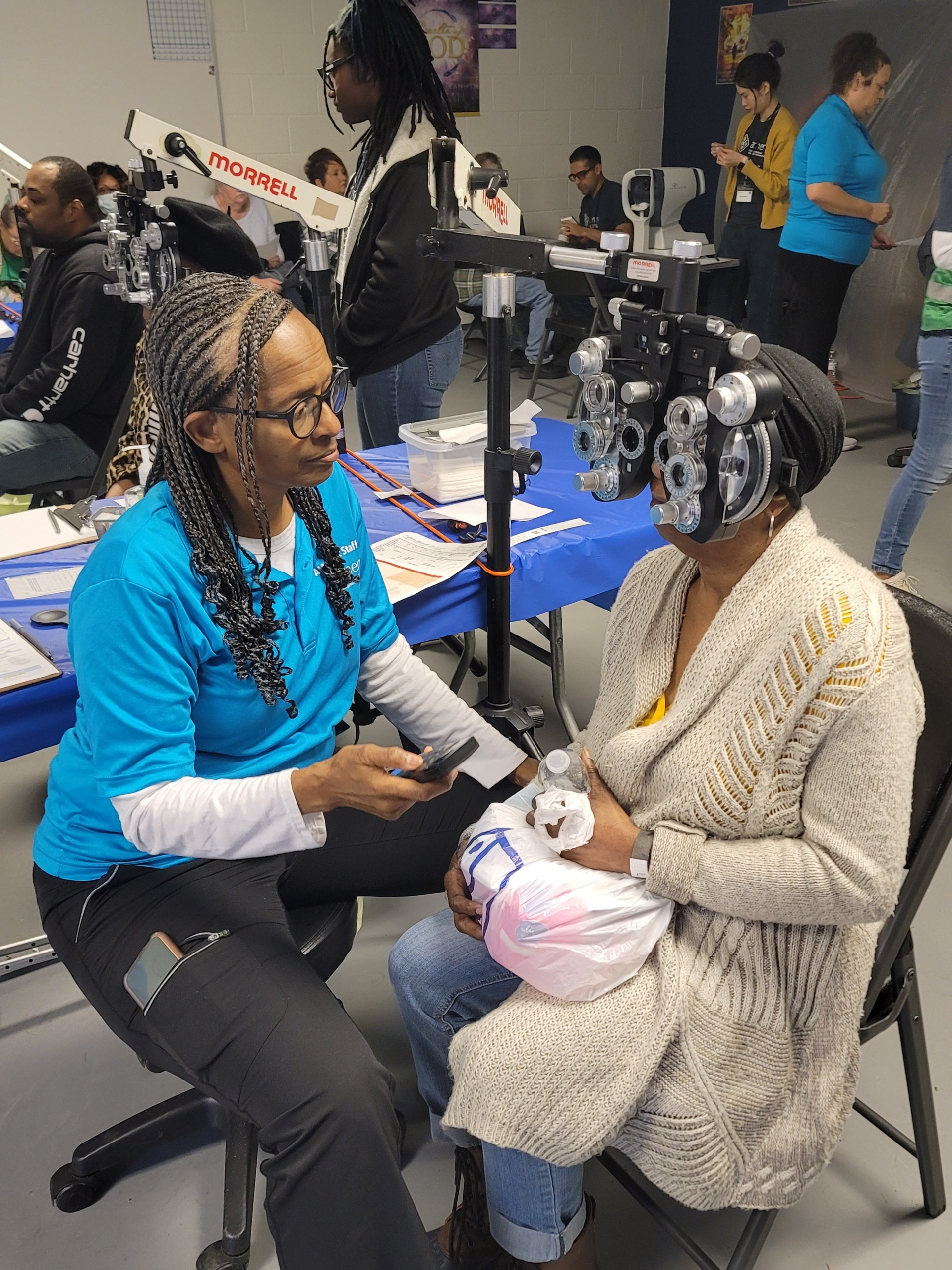 Dr. Gayle Daniels with patient in clinic pic2