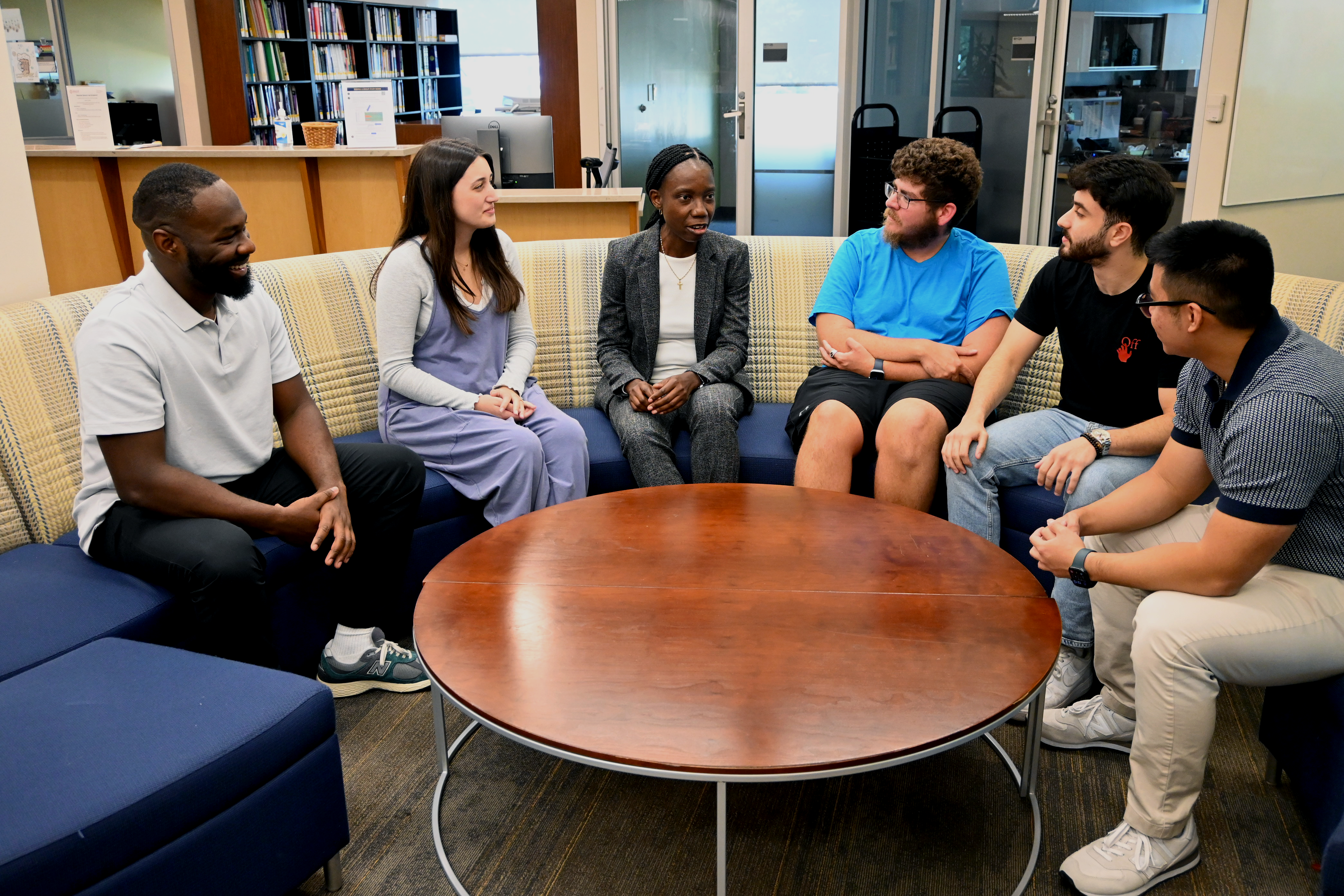 Josephine Ibironke meets with students in library pic