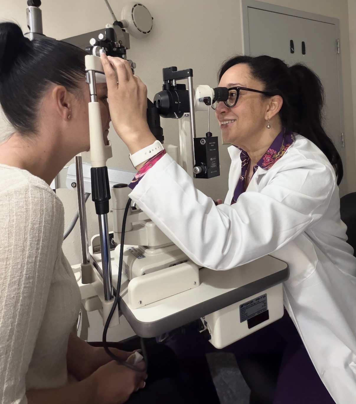 Dr. Junean Marshall examining patient