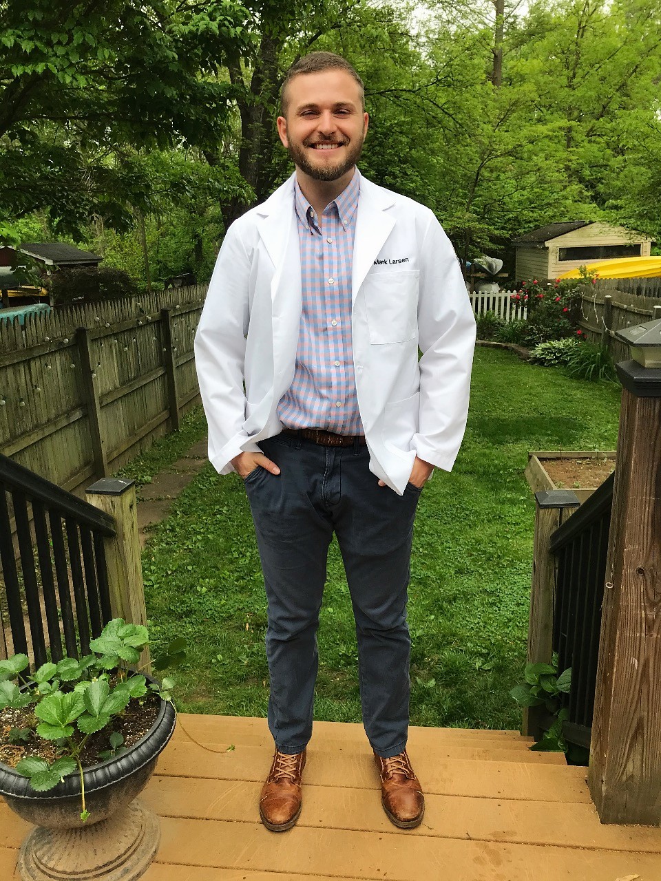 OT Mark Larsen in white coat