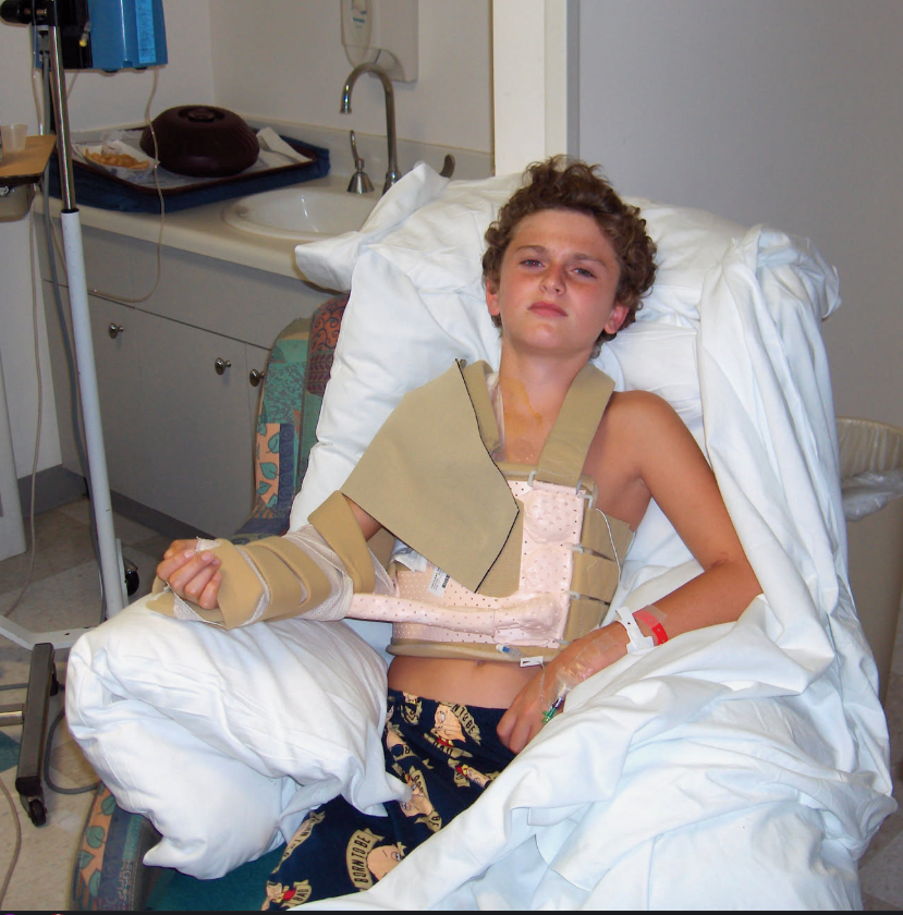 Young Mark Larsen in hospital bed