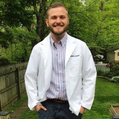 OT Mark Larsen in white coat thumb1