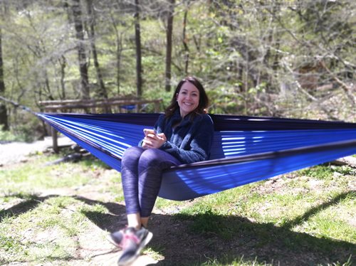 Meghan Thompson sitting on a hammock