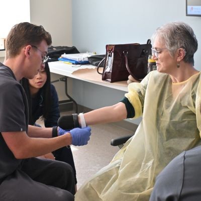 O&P students help patient model in lab thumbpic1