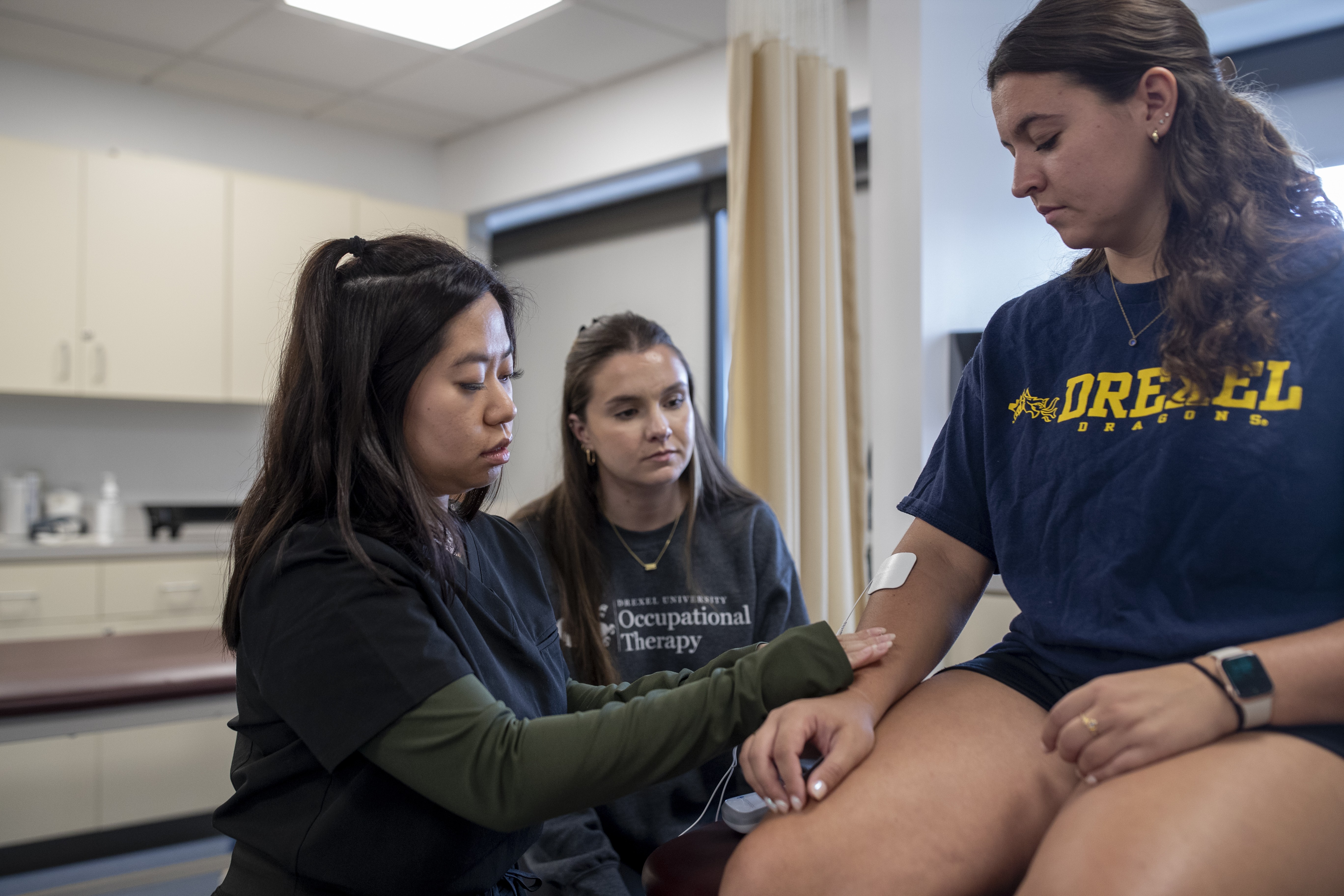 Two OT students with patient pic1