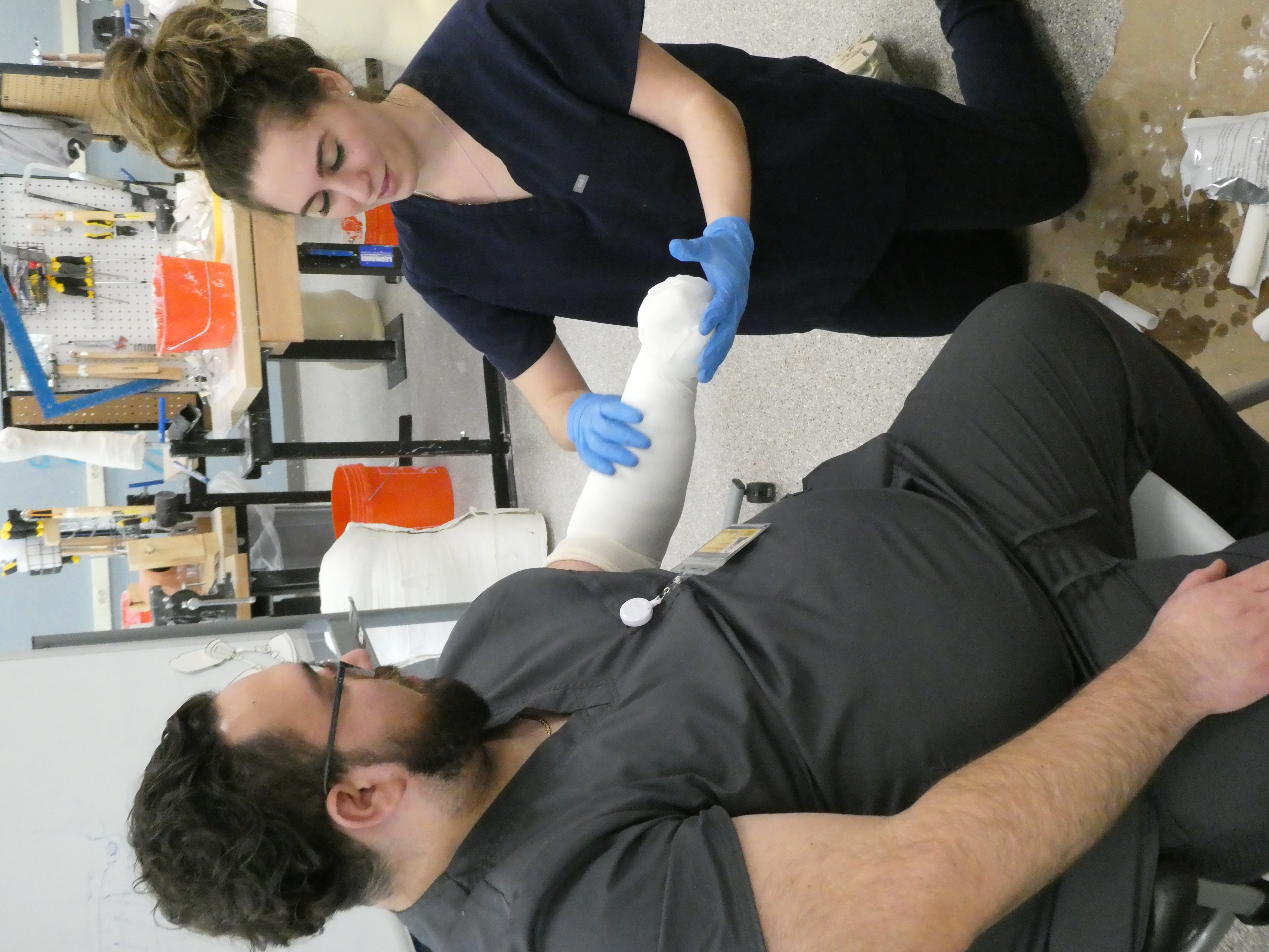 Student practices casting on O&P classmate pic