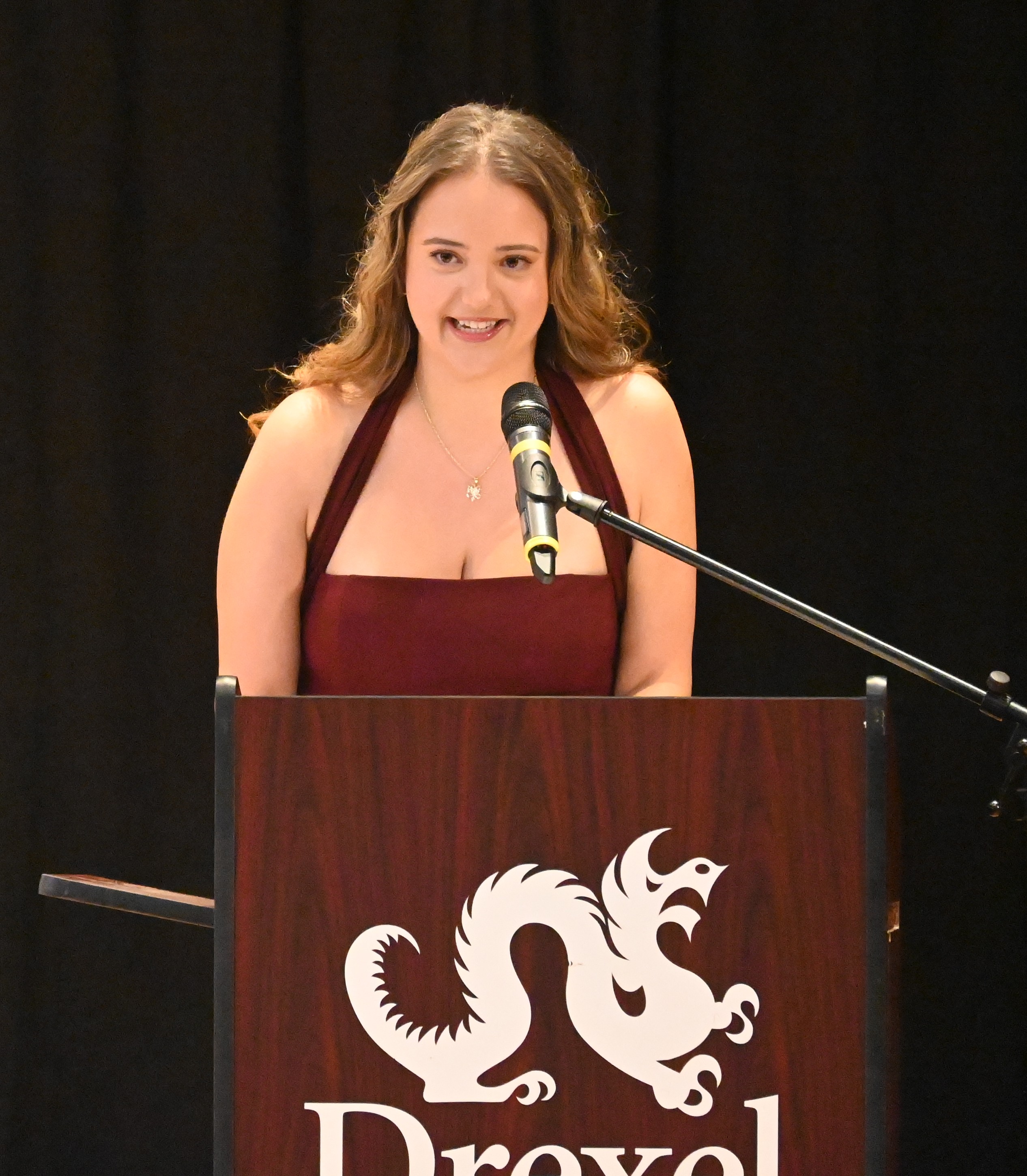 Bora Feruku speaks at white coat