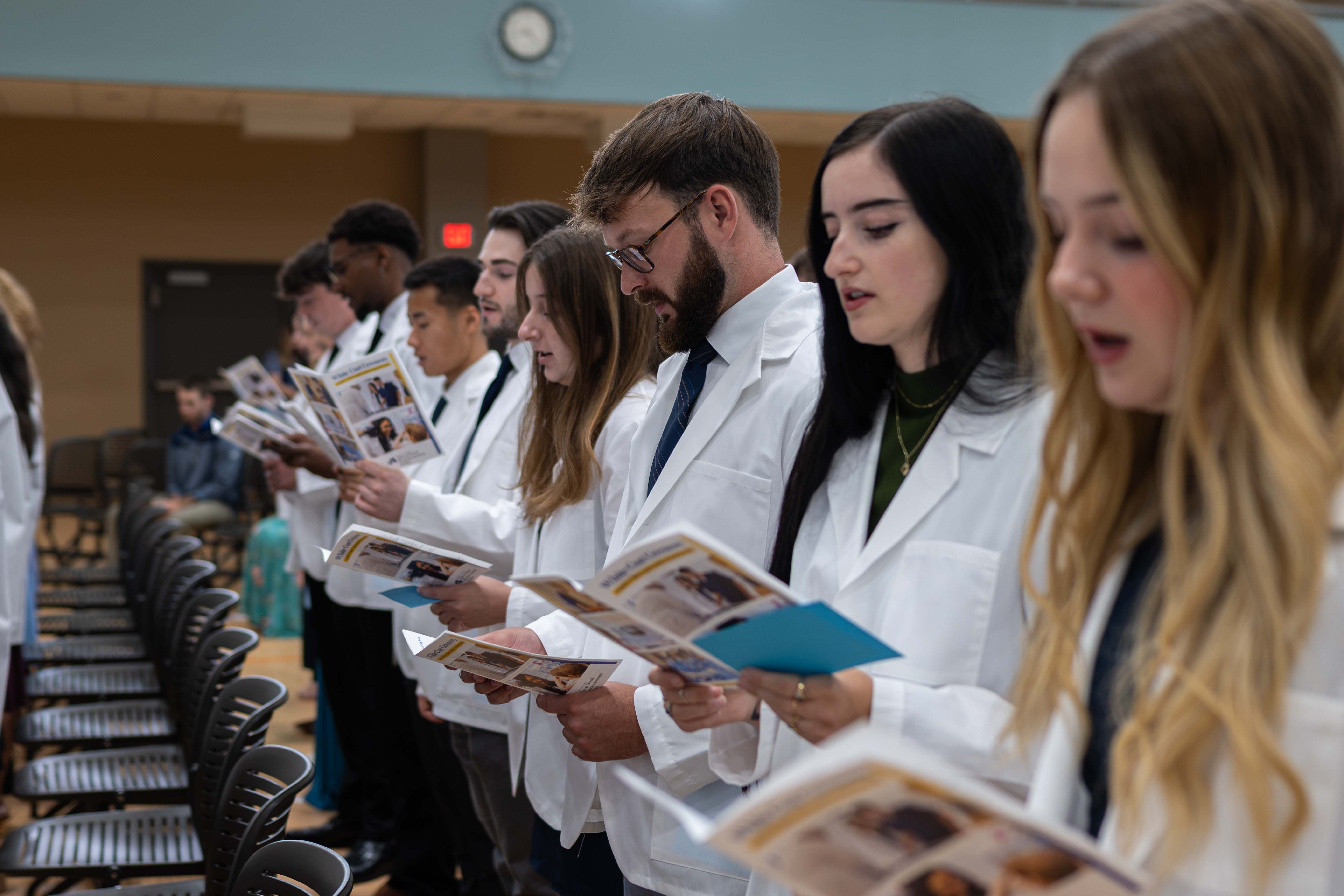 PA Students take the oath of professionalism at white coat