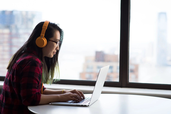 Woman working on a laptop