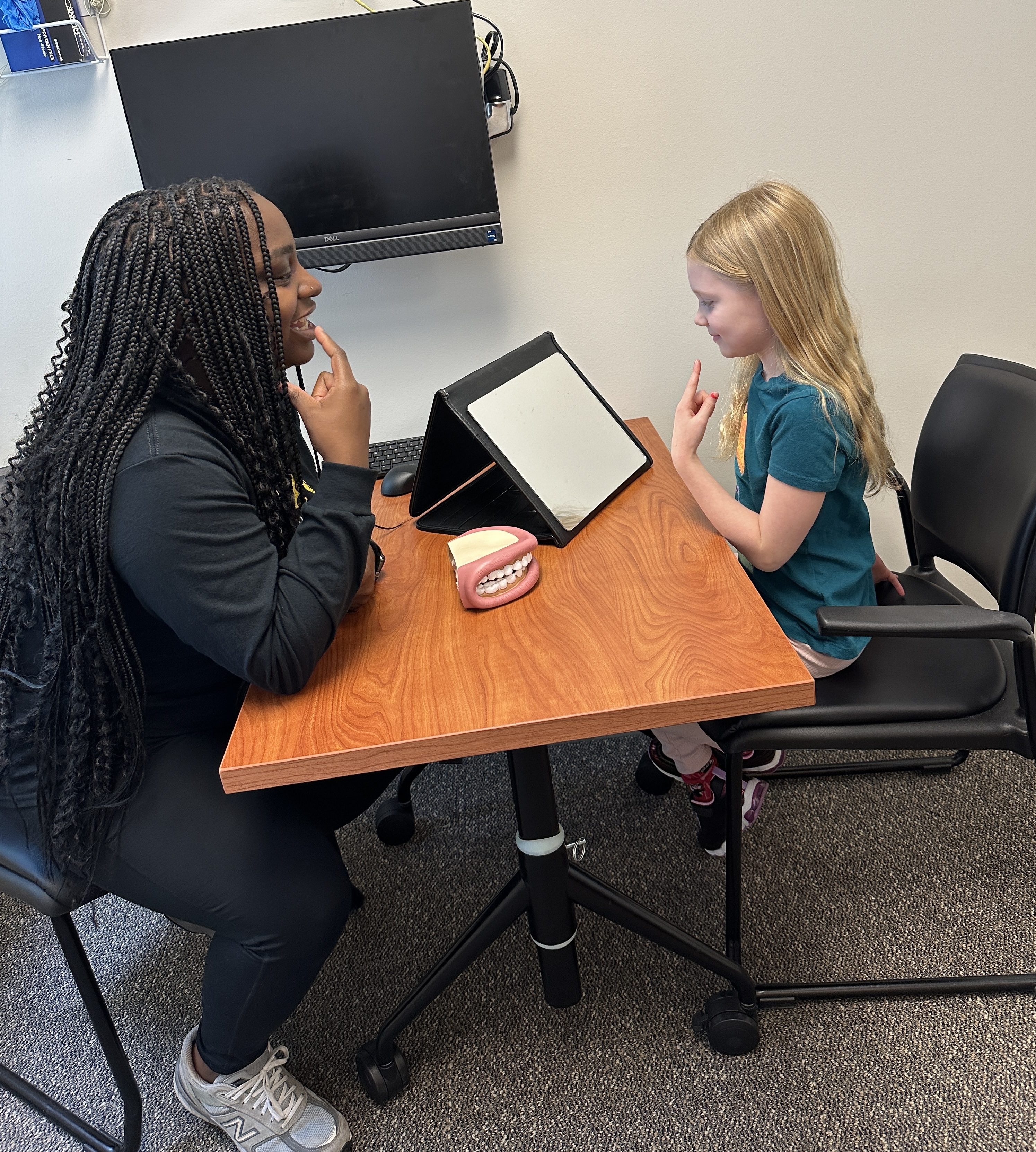 SLI students works with child client pic2