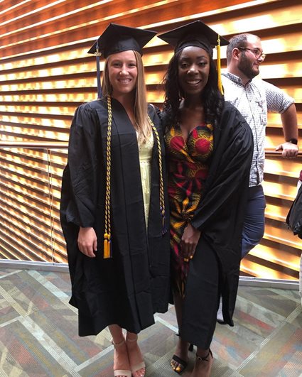 Two students at commencement