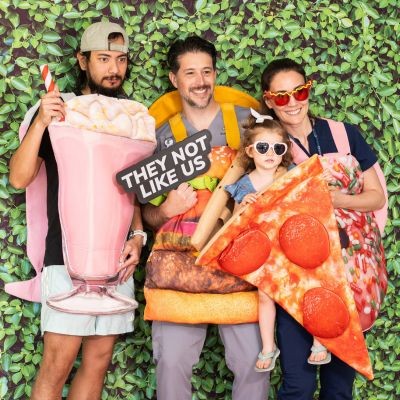 Family in the photo booth at summer barbecue thumbpic