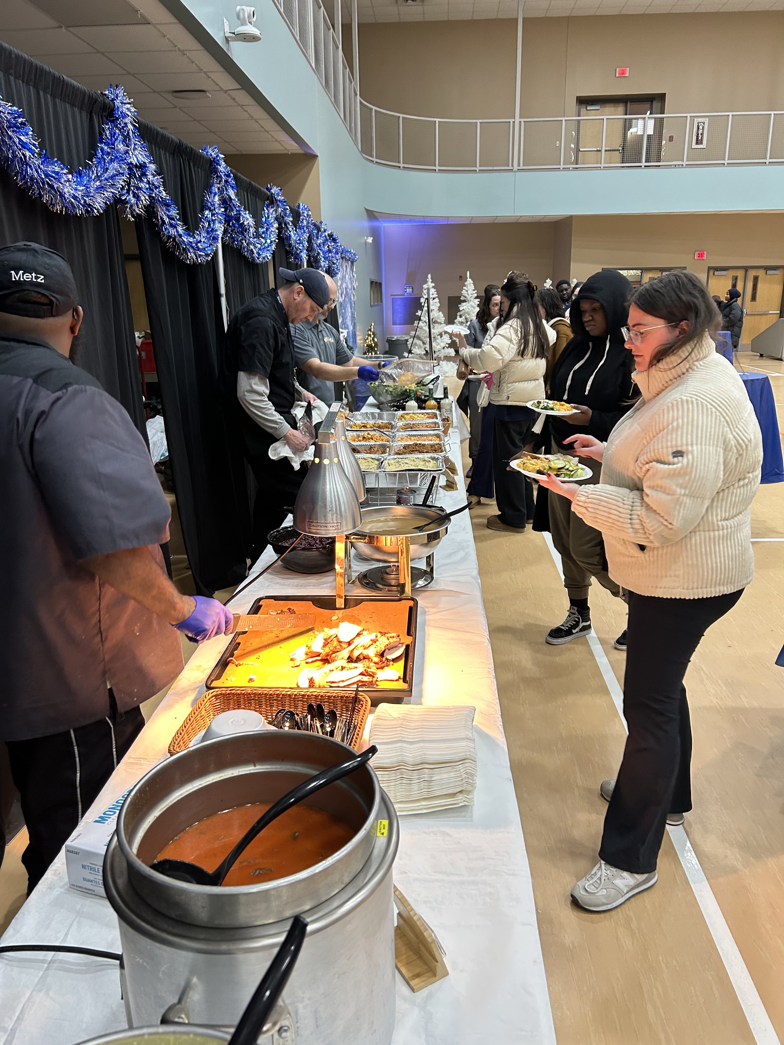 Student line up for chow at Winterfest26 pic3