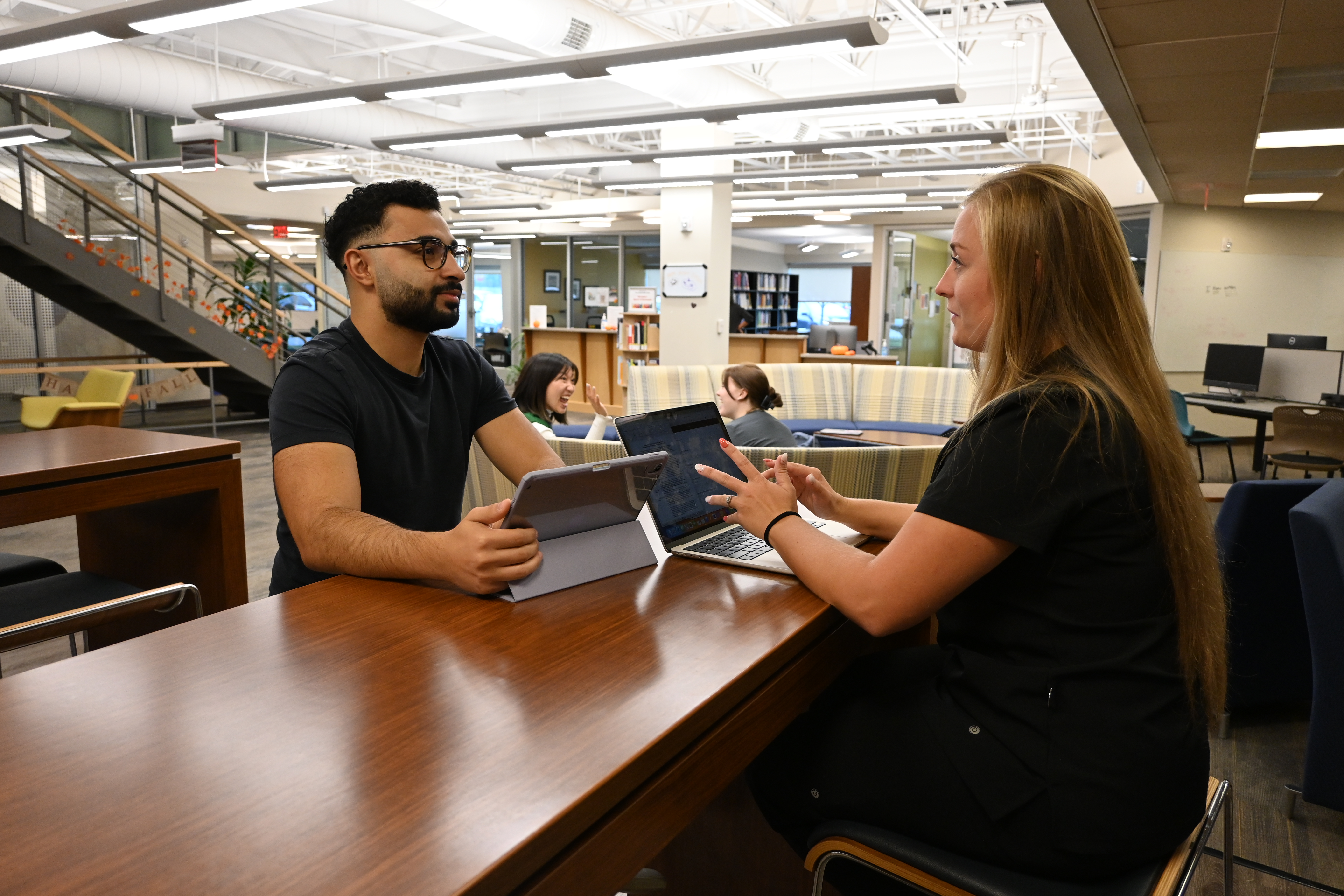 two students in the library