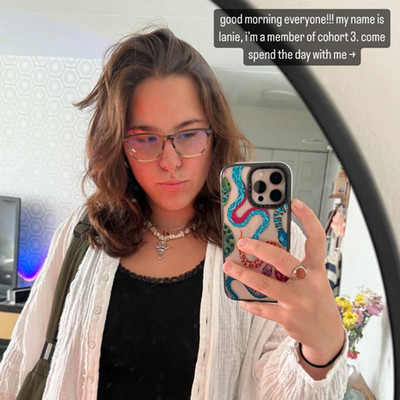 Lanie taking a selfie in the mirror