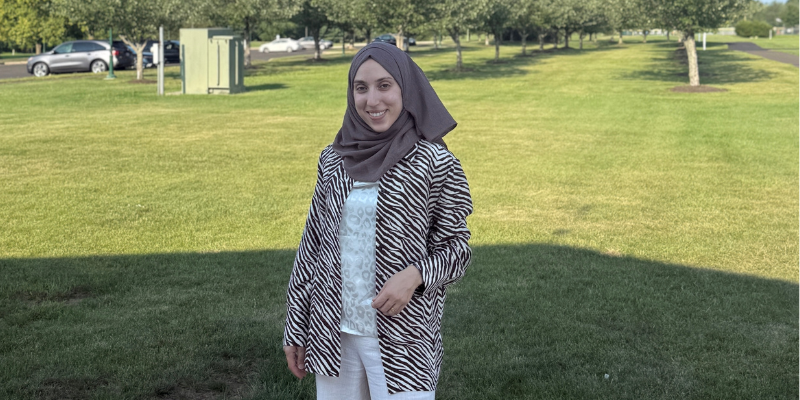 Amal standing in a field