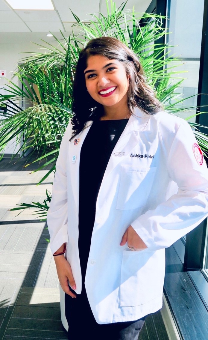 Ashka headshot in white coat