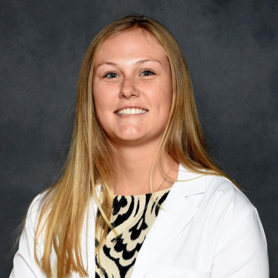 Cassidy wearing her white coat