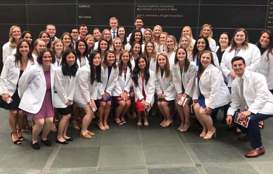 PA class photo in their white coats