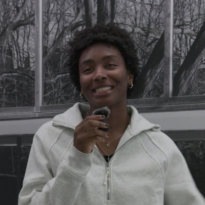 Chyna holding a microphone