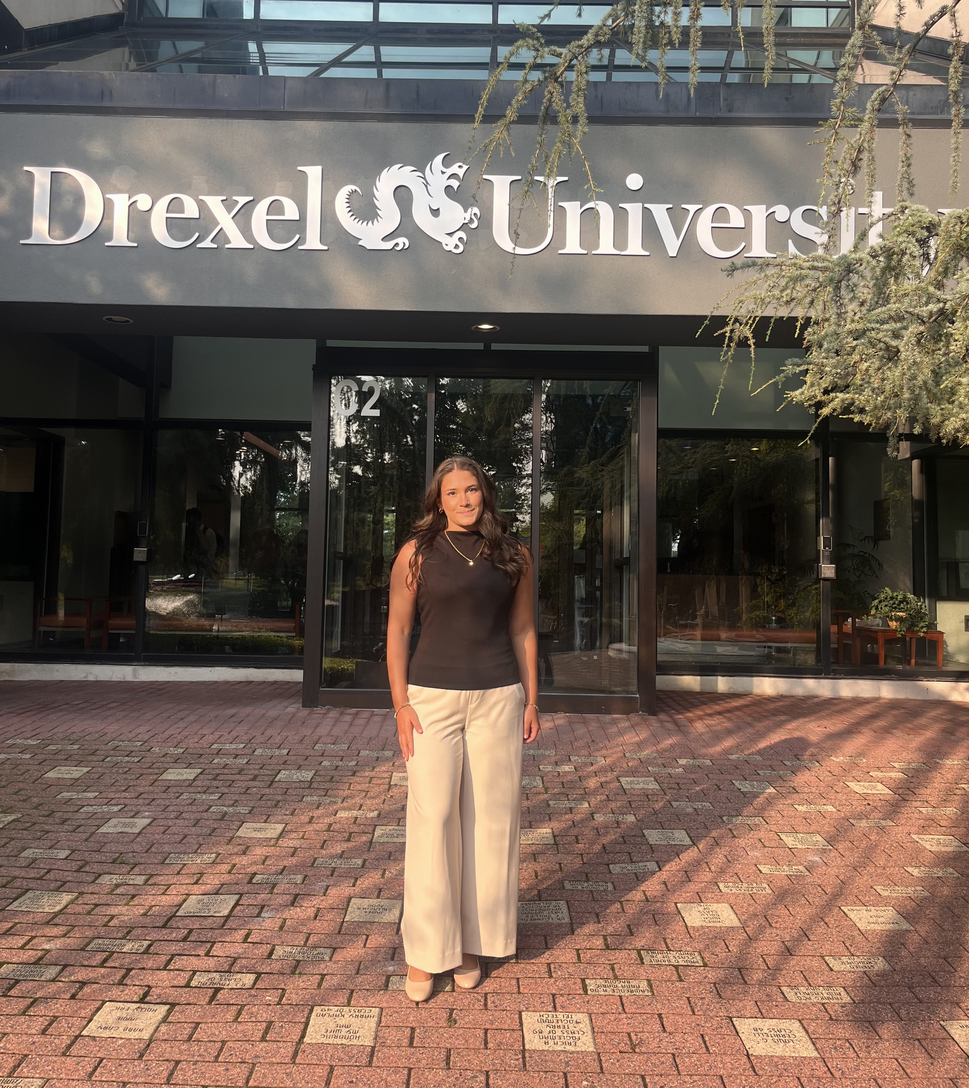 Corrina standing in front of Drexel building