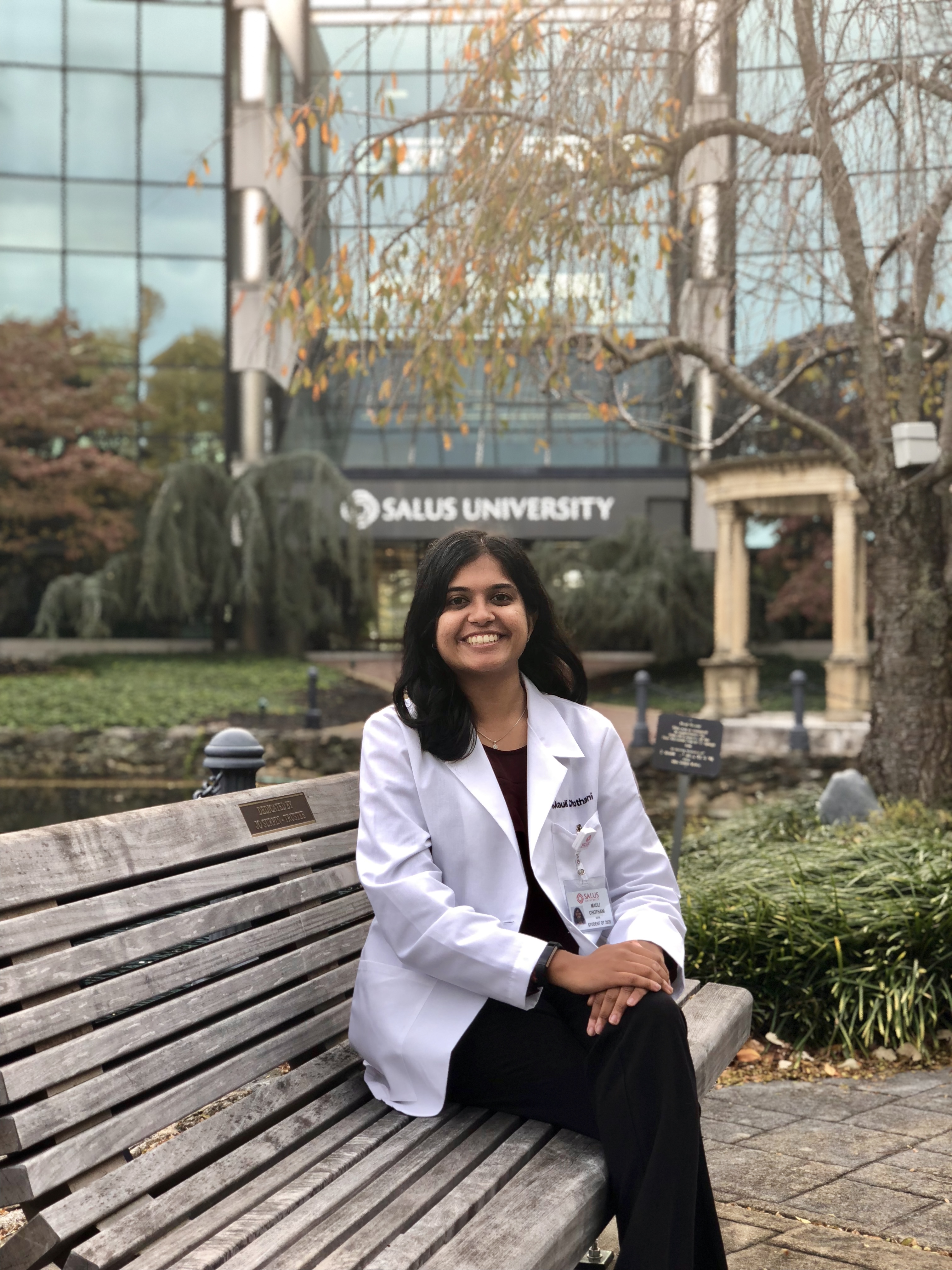 Mauli headshot at Salus main entrance