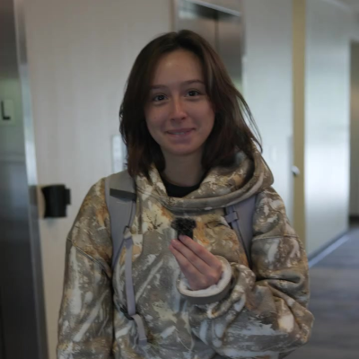 Hailey talking into a microphone