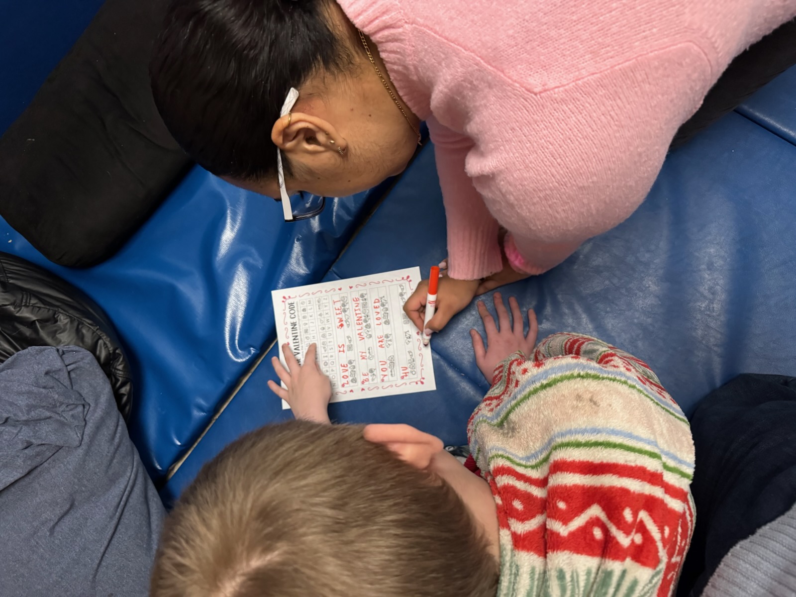 Ashley working with student