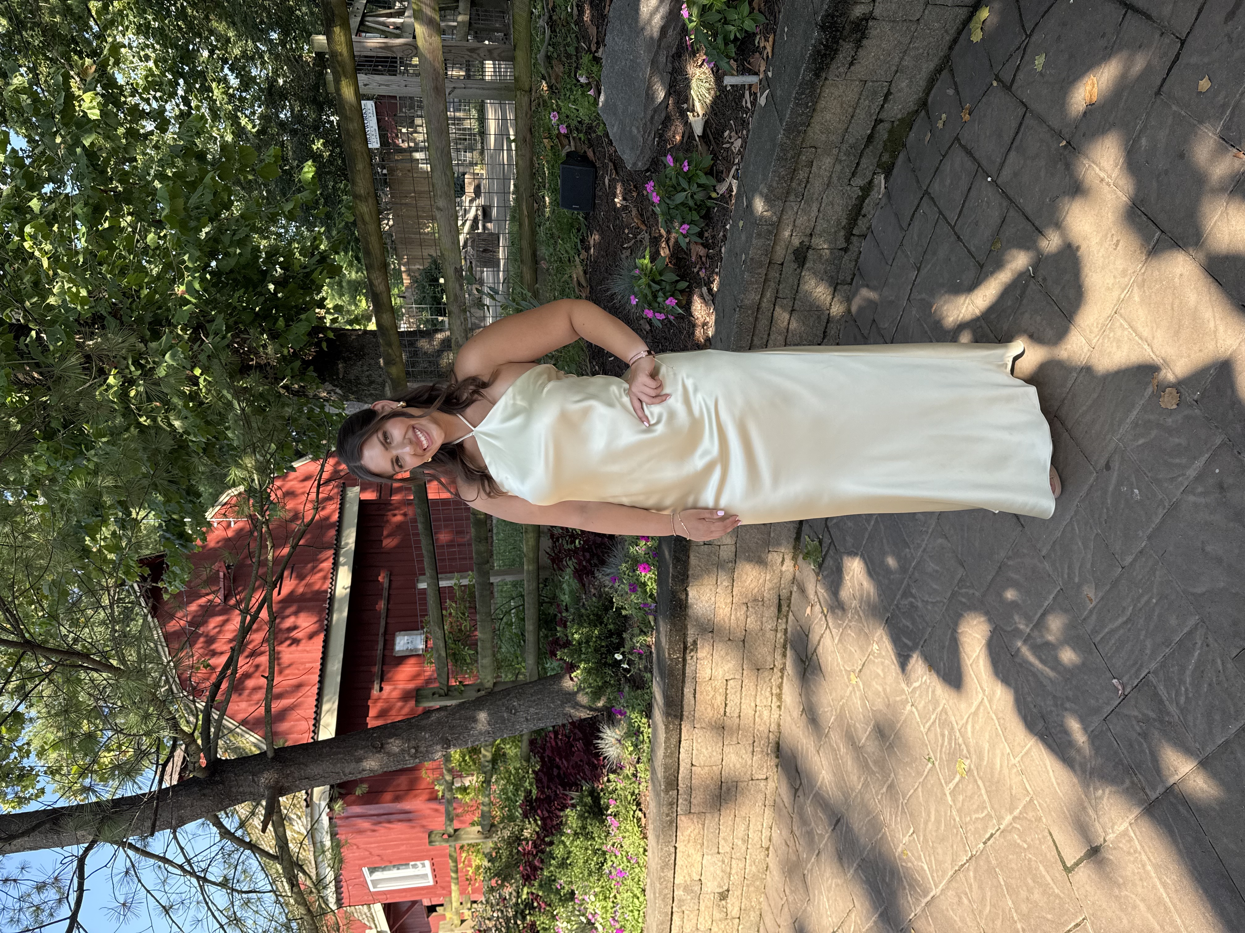 Francesca wearing a silk dress