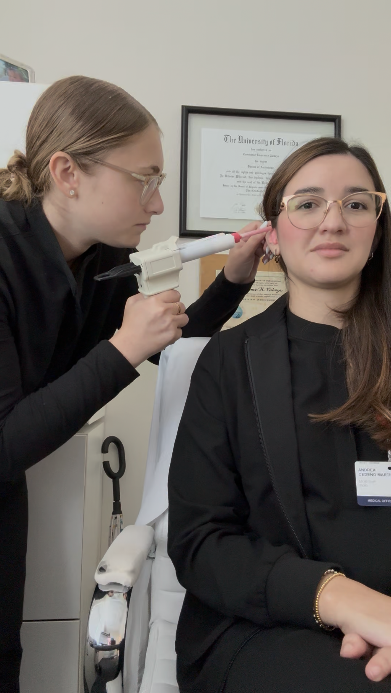 audiologist treating a patient