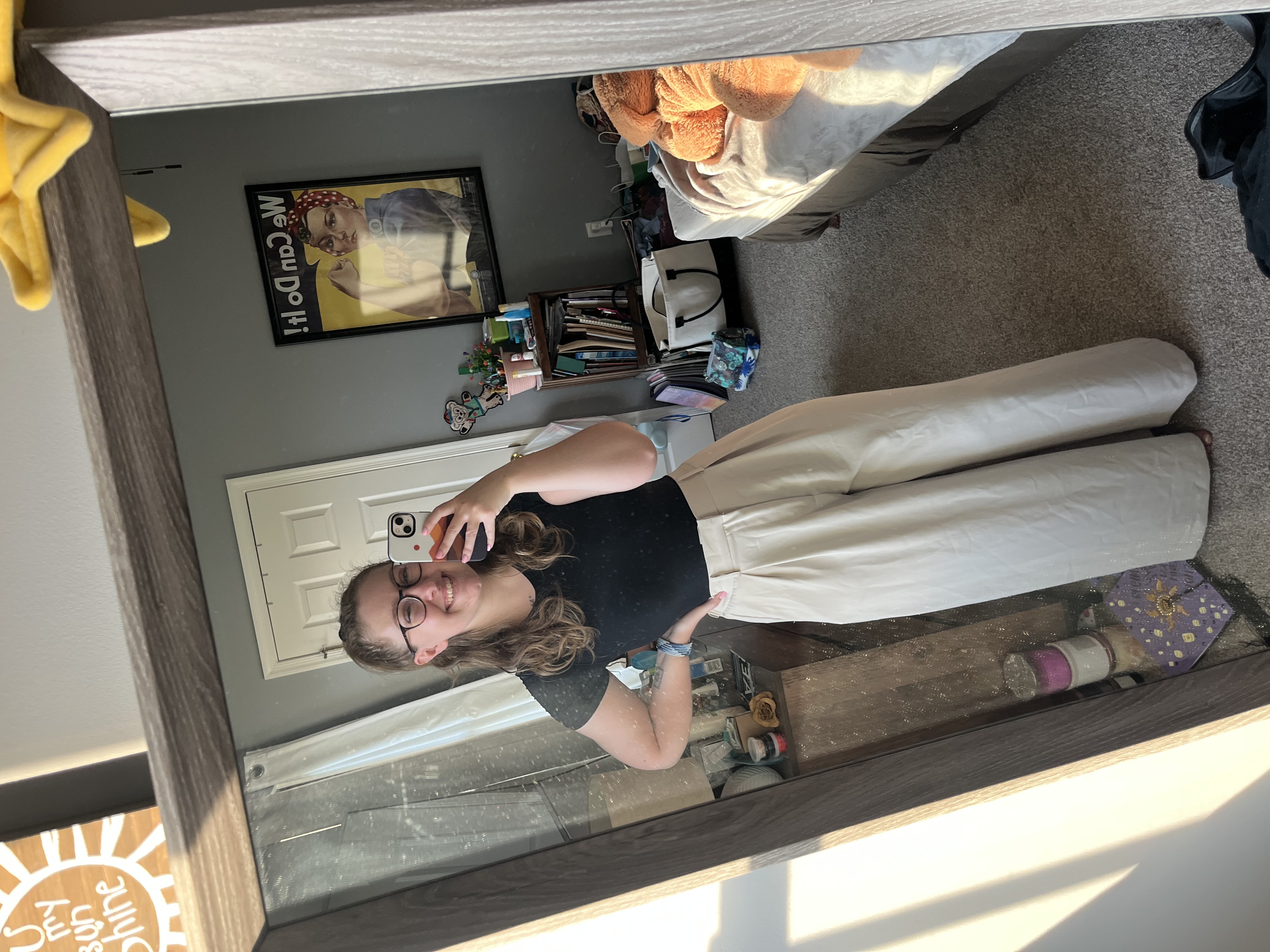 Hannah taking a selfie in the mirror