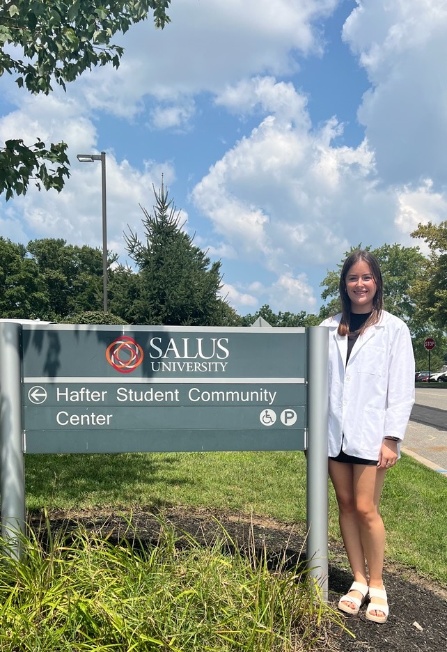 Ava in her white coat